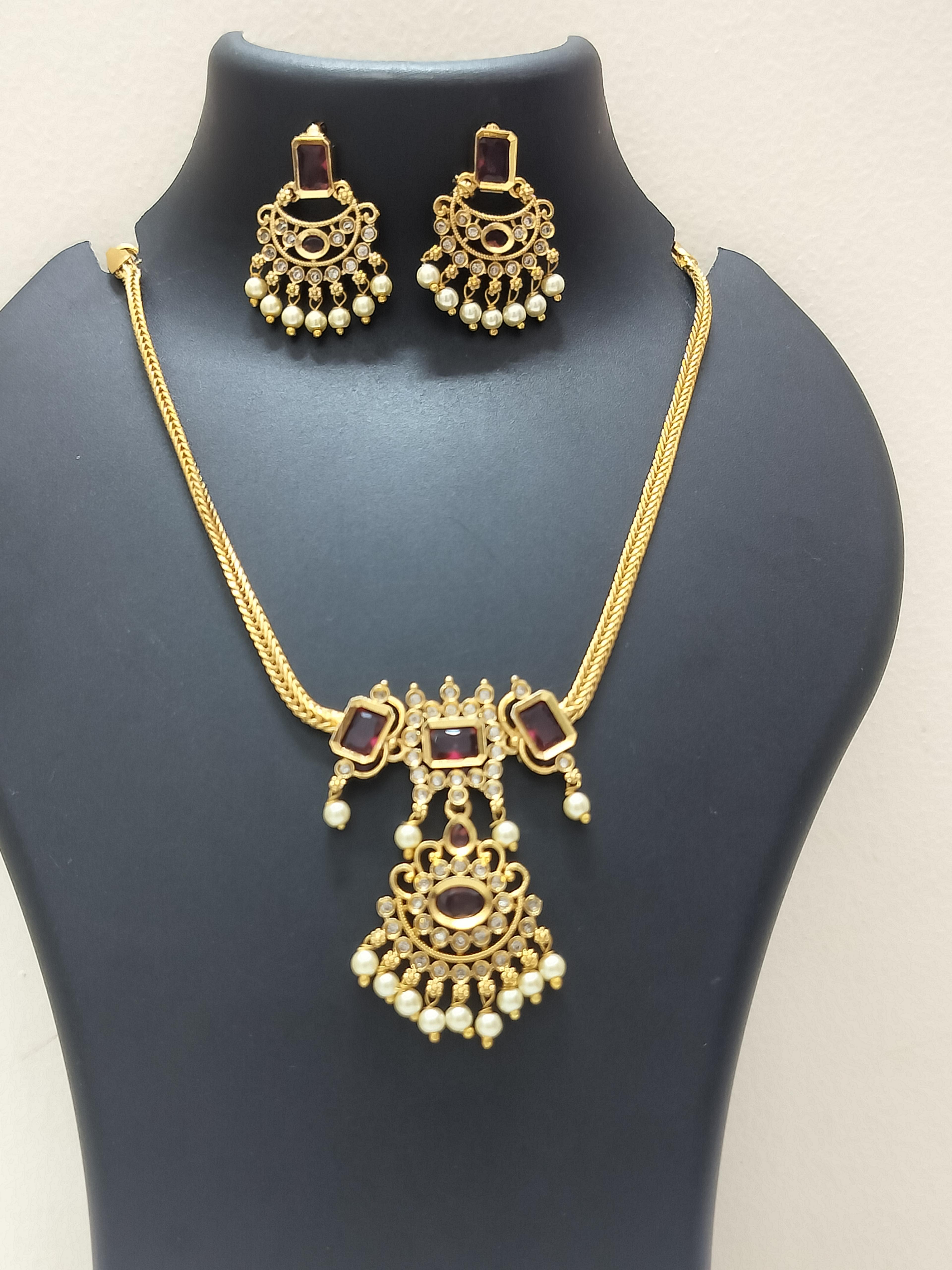 Heritage gold finish ruby pendant - product media
